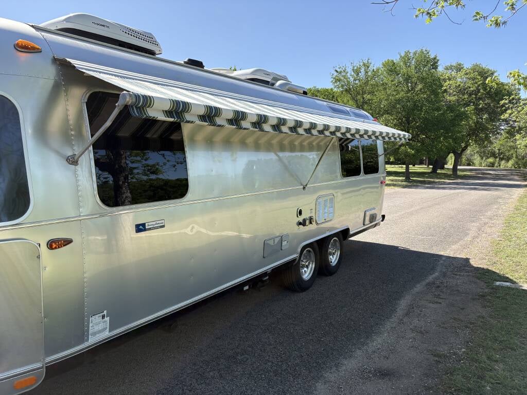 2019 Airstream Tommy Bahama Special Edition 27FB — awning with Sunbrella fabric