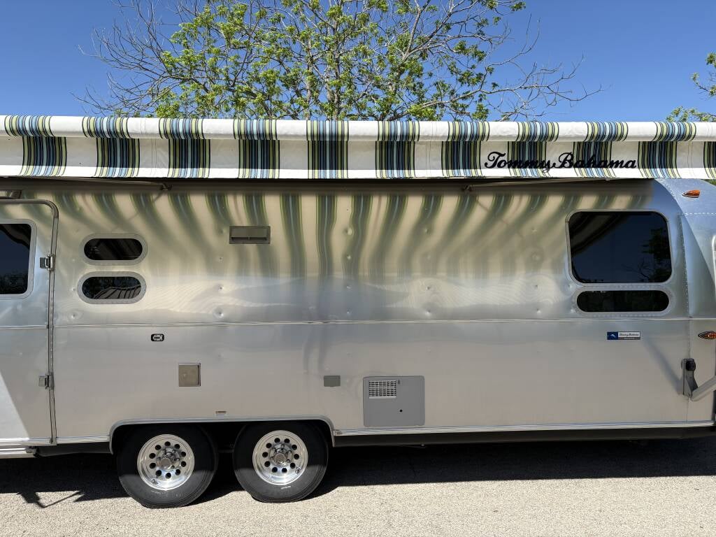 2019 Airstream Tommy Bahama Special Edition 27FB — powered ZipDee patio awning