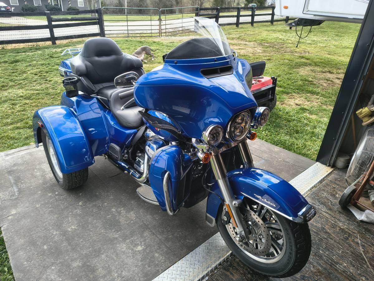 2024 Harley-Davidson Tri Glide Ultra Classic in Bright Blue Burst — front three-quarter view