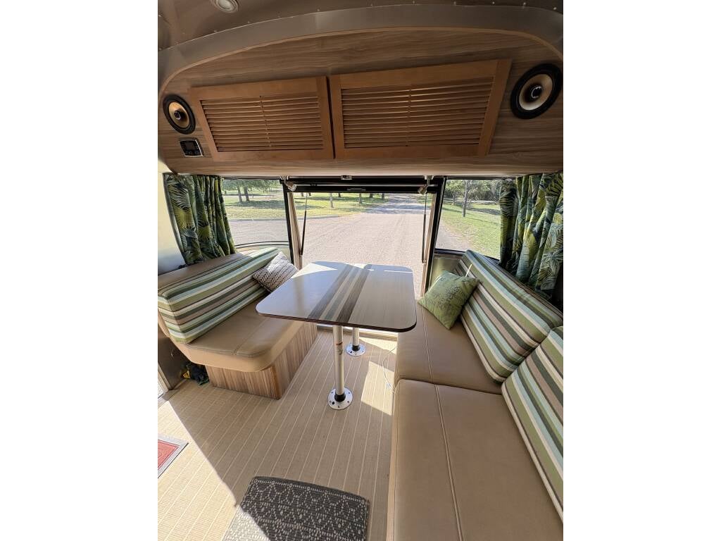 2019 Airstream Tommy Bahama Special Edition 27FB — dinette with Tommy Bahama curtains