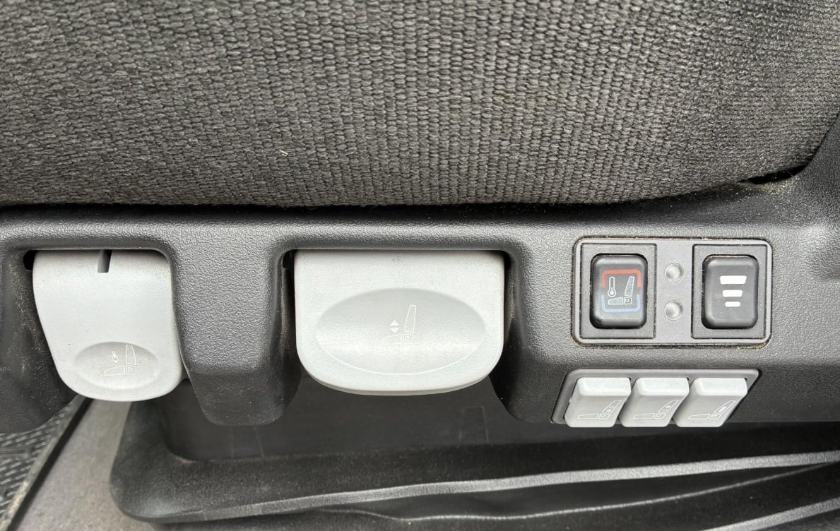 2023 Freightliner Cascadia 126 — seat adjustment controls
