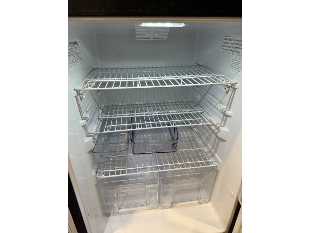2022 Airstream Flying Cloud 27FBQ — refrigerator with door open