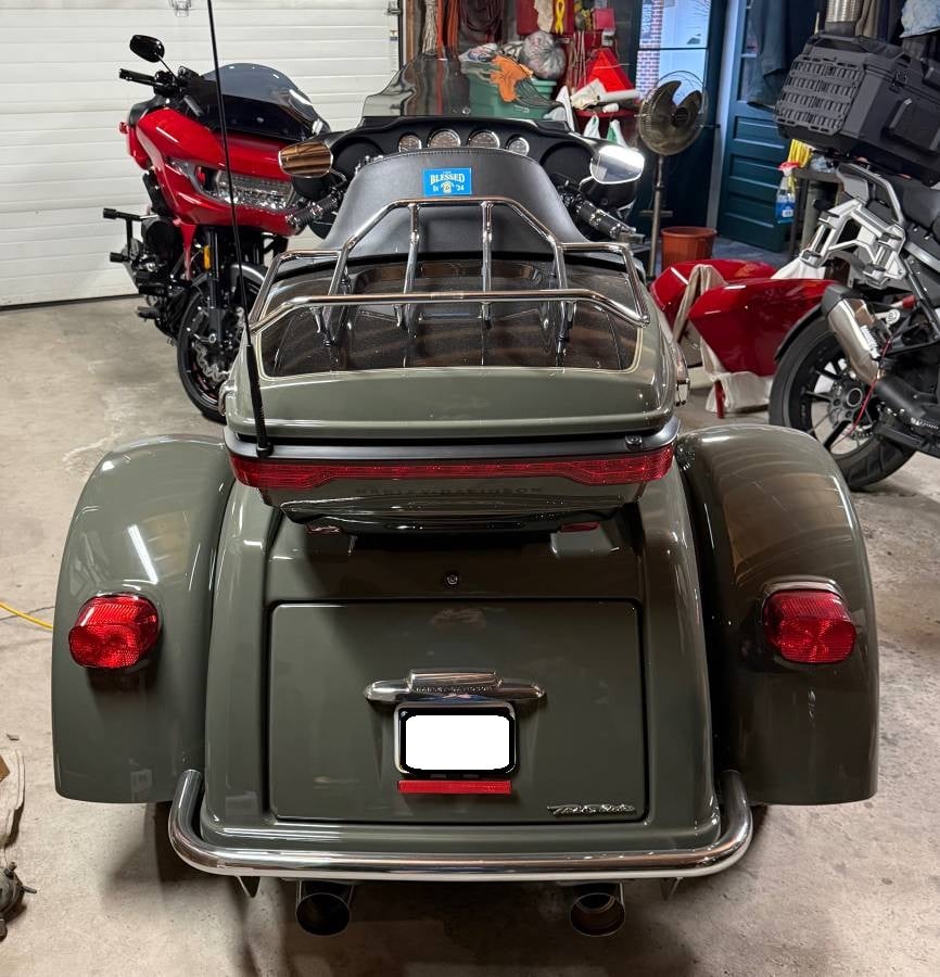 2021 Harley-Davidson Tri Glide in the garage — three-quarter view