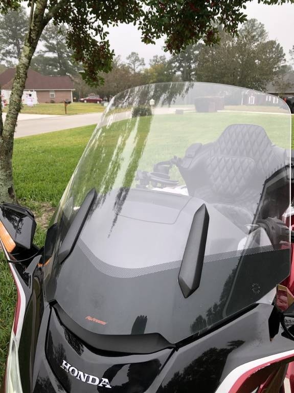 Aftermarket wide wind screen on the Goldwing trike