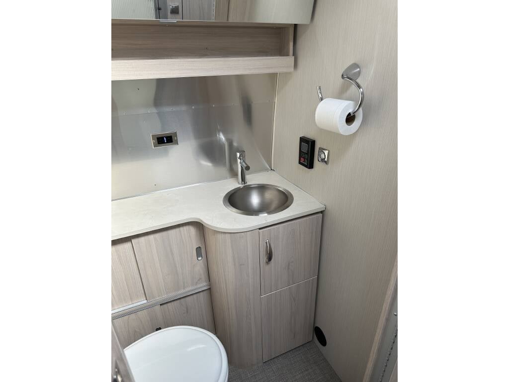 2021 Airstream Globetrotter 27FB Twin — bathroom vanity and toilet