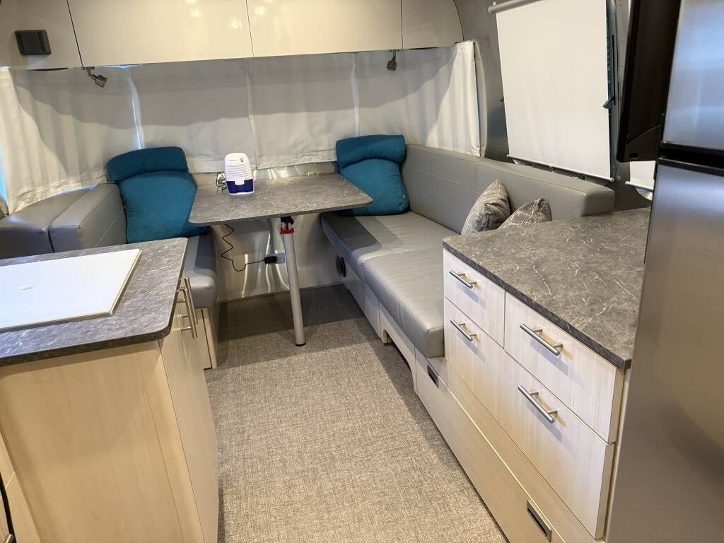 2022 Airstream Flying Cloud 27FBQ — dinette and kitchen view
