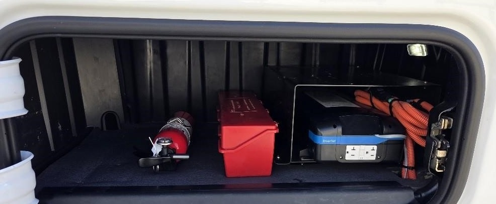 2024 Freightliner Cascadia 126 — inverter and storage compartment