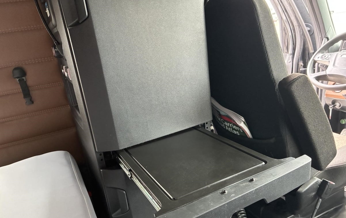 2023 Freightliner Cascadia 126 — sleeper interior with TV mount and desktop