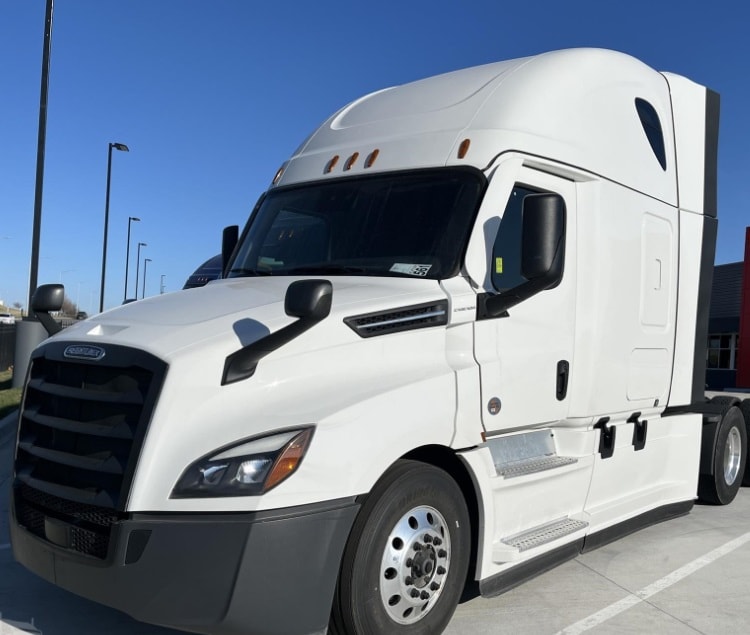 2023 Freightliner Cascadia 126 sleeper semi truck in white — front three-quarter view